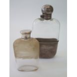 A Victorian Silver Mounted Glass Hip Flask, Sheffield 1897, James Dixon & Sons Ltd. and one other