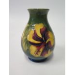 A Moorcroft Hibiscus Decorated Vase, 14 cm