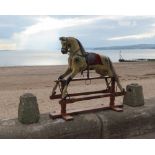 A Fine Dapple Grey Rocking Horse on safety rocker base, 127cm high Given new to the vendor eighty