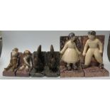 A Pair of Bronze Squirrel Bookends, Pair of Pottery Dutch Boy and Girl Bookends signed Renson