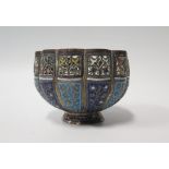 An Antique Persian Gilt Copper and Enamel Lobed Bowl with pierced border and foliate decoration,