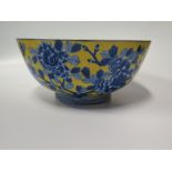 A Large Chinese Yellow Ground Porcelain Bowl decorated with blue chrysanthemums, mark to base, 31 cm