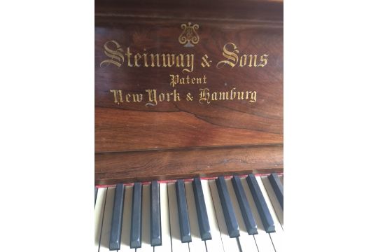 Steinway (c1894)
A Vertegrand upright piano in a rosewood case.