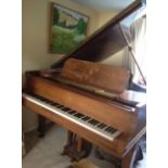 Steinway (c1910) 
A 5ft 10in Model O grand piano in a rosewood case on square tapered legs.