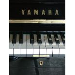 Yamaha (c2003) 
A Model SU131 upright piano in a bright ebonised case.