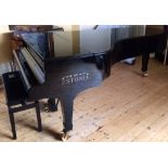 Estonia (c2006)
A 9ft concert grand piano in a bright ebonised case on square tapering legs,