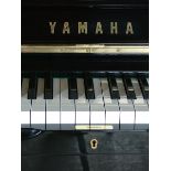Yamaha (c1994) 
A Model U3 upright piano in a bright ebonised case.