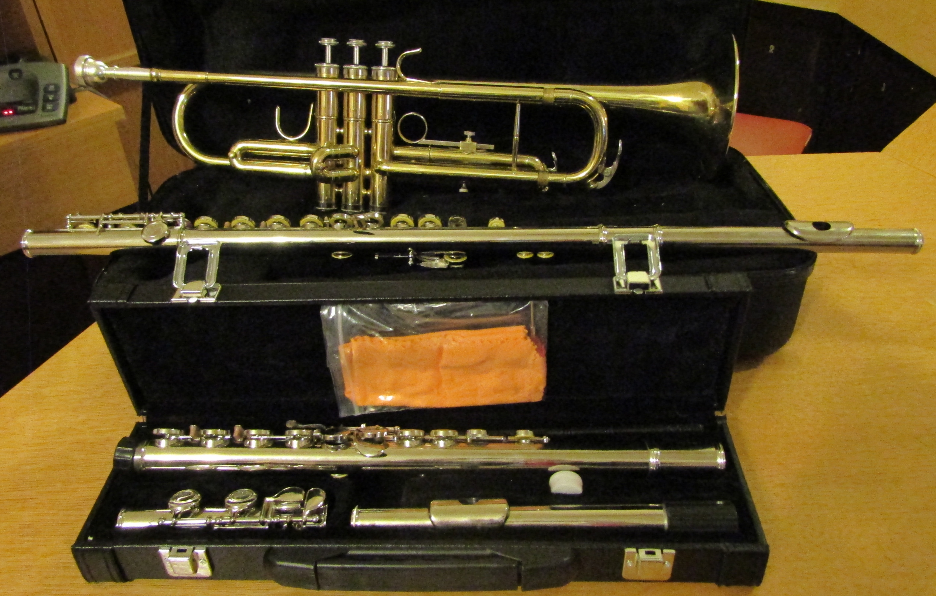 A recent trumpet and 2 recent flutes.