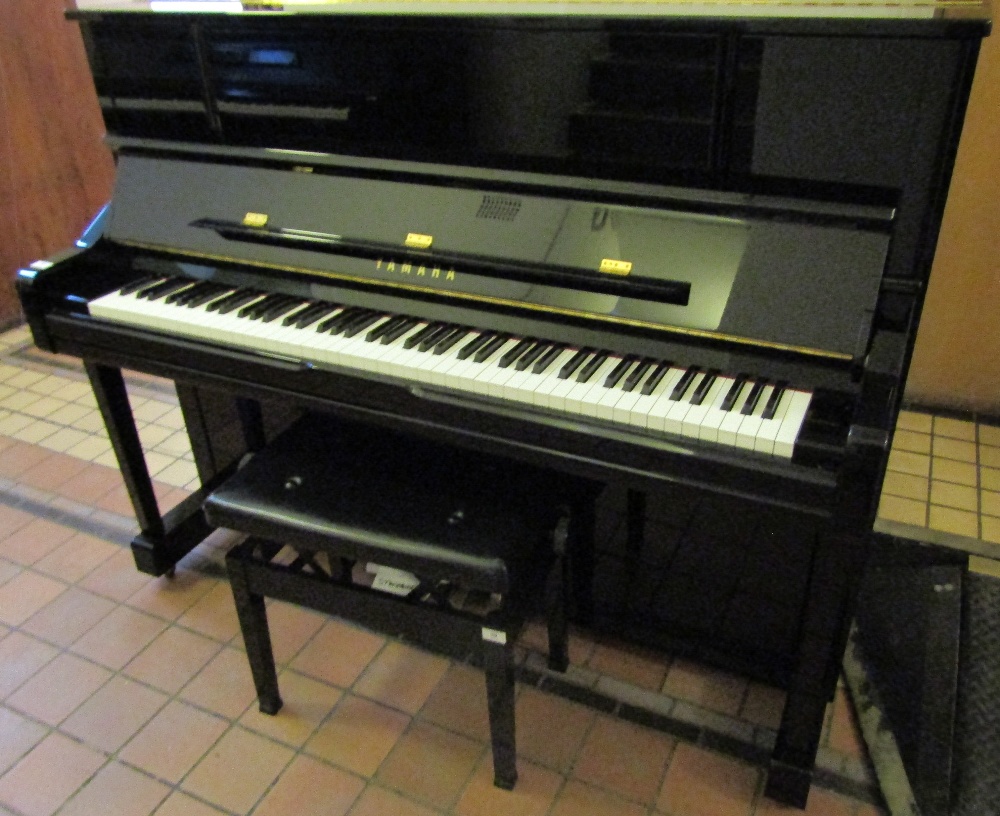 Yamaha (2006)
A Model YU10 upright piano in a bright ebonised case together with a stool.