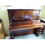 Steinway (c1881)   
An upright piano in a rosewood case with fretwork front panels,