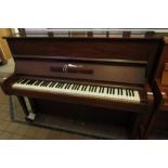 Steinway (c1939) 
A Model Z upright piano in a mahogany case.