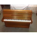 Cramer (c1970s) 
A modern style upright piano in a mahogany case.