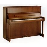 Kemble (c2007)
A Model K121CL upright piano in a satin finish American walnut case,