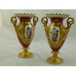 A pair of H & R Daniel porcelain vases with gilt leaf rim, gilt scroll handles, puce ground and