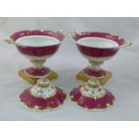 A pair of H & R Daniel porcelain cream bowls and covers, Shell Border shape, with vine and fruit