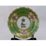 An H & R Daniel porcelain saucer, Shrewsbury shape, decorated with the coat of arms of the Earl of