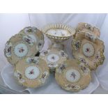 An H & R Daniel porcelain 13 piece dessert service, Mayflower shape, the raised floral ground