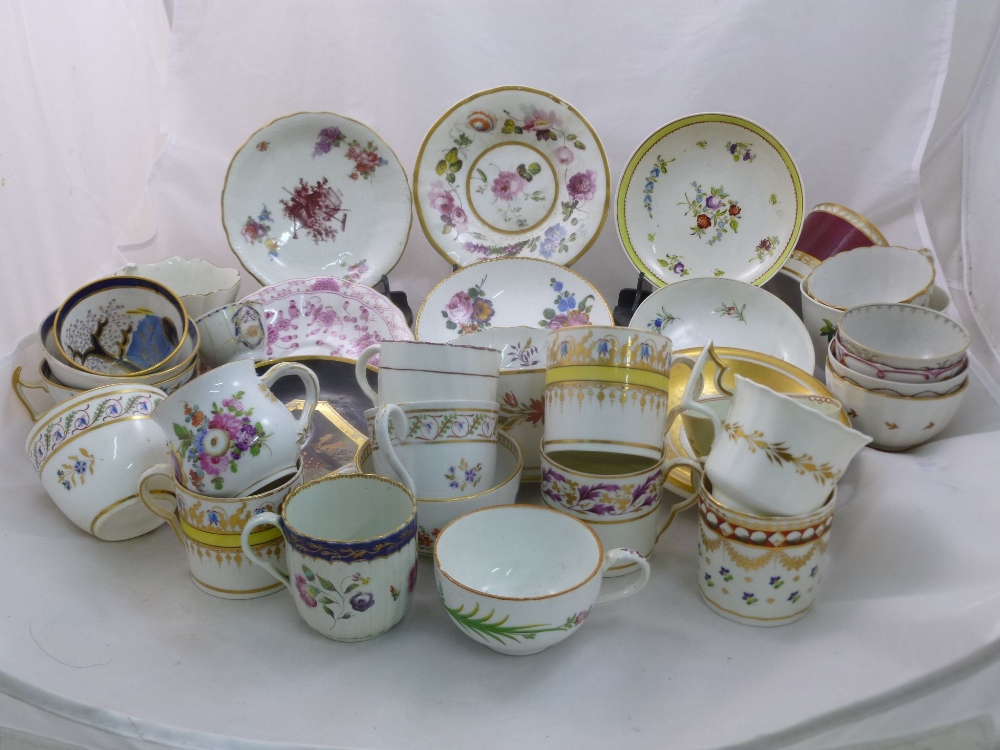 A collection of 18th century and later English porcelain and other teacups, tea bowls and saucers,