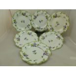 Six porcelain dessert plates, in the style of H & R Daniel, Shell shape, decorated with hand painted