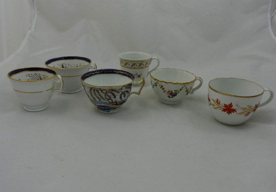 A collection of 18th century and later English porcelain and other teacups, tea bowls and saucers, - Image 10 of 14