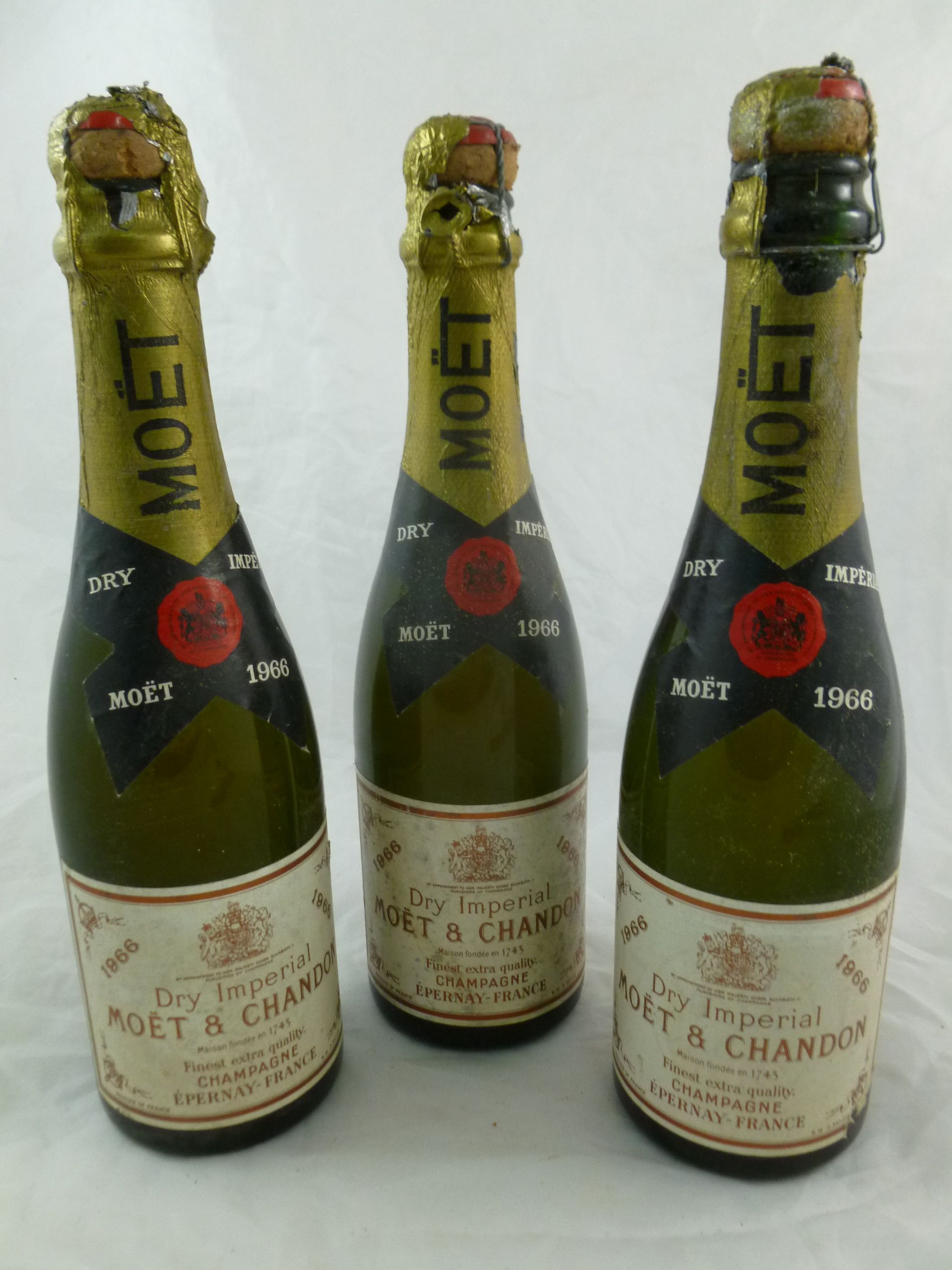 Three half bottles of 1966 Moet and Chandon champagne