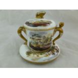 A 19th century Spode porcelain chocolate cup, cover and stand decorated with landscapes,