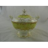 An H & R Daniel porcelain sucrier, shell variation A shape, with circular pedestal foot,