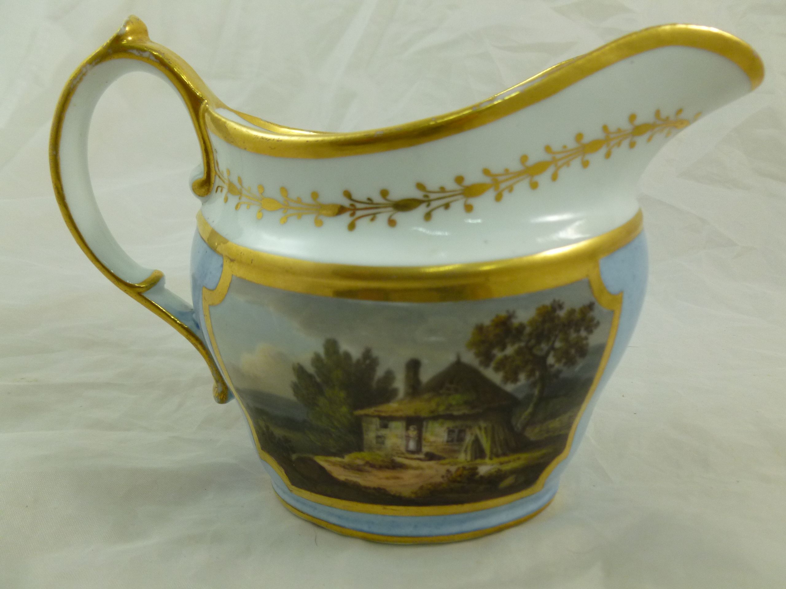 Two late 18th/early 19th century porcelain milk jugs, the first decorated with hand painted rural - Image 2 of 18