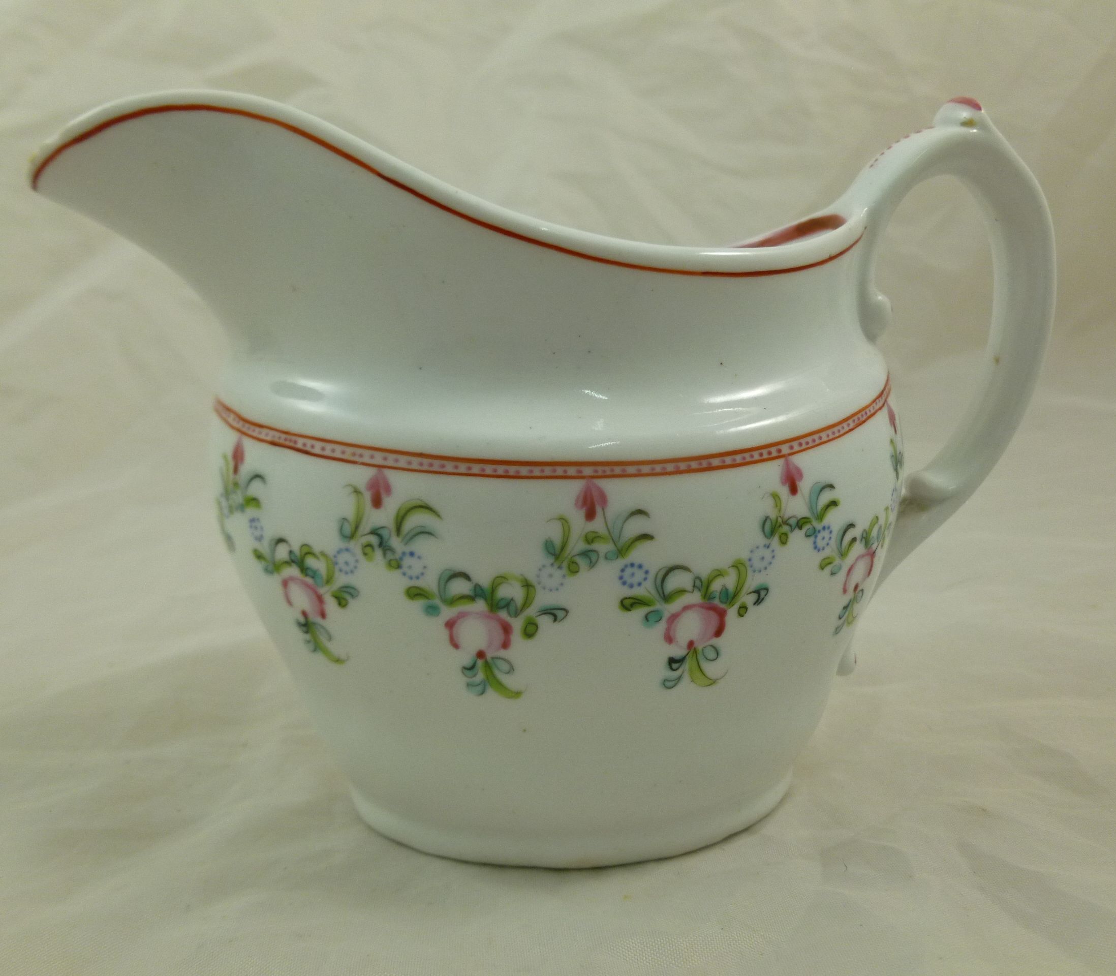 Two late 18th/early 19th century porcelain milk jugs, the first decorated with hand painted rural - Image 5 of 18