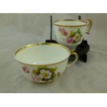 A Swansea porcelain coffee cup and tea cup possibly decorated by William Pollard, teacup 5cm high,