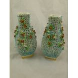 A pair of 19th century English Schneeballen style porcelain flower encrusted vases,