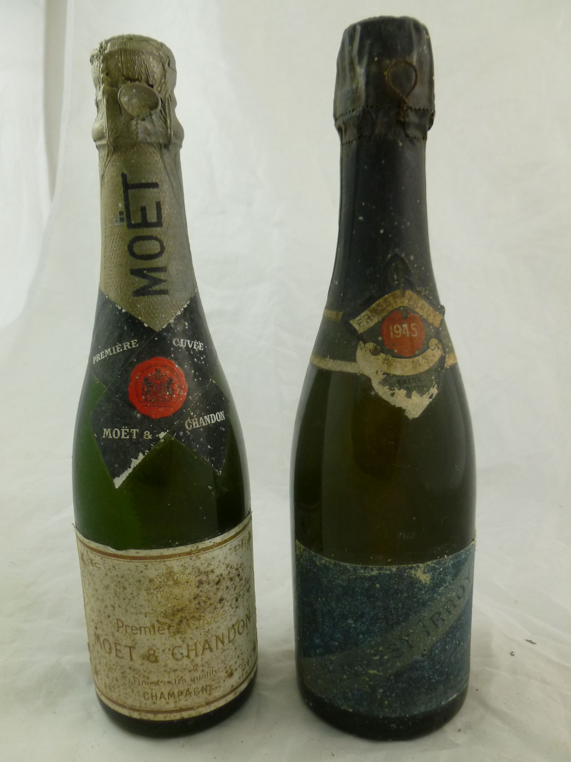 An Ernest Irroy, 1945, 1/2 bottle of champagne and a 1/2 bottle of Moet et Chandon CONDITION REPORT: