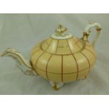 An H & R Daniel porcelain teapot, second gadroon shape variation A, with gilt detail and sandy