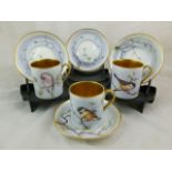 Three bone china coffee cans and four matching saucers decorated by Leighton Maybury,