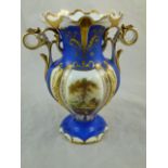 A 19th century porcelain two-handled vase with blue ground,