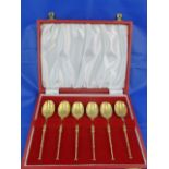 A set of six silver gilt anointing spoons, commemorating Queen Elizabeth II's silver jubilee,