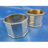 A pair of large early 20th century German silver hexagonal section napkin rings, 3.