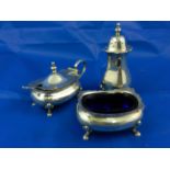 A George V silver cruet set, of classic form, comprising mustard with liner,