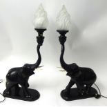 Pair of carved wood elephant table lamps approximately 76cm