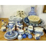 Quantity of blue and white china, Staffordshire spaniel dogs, carpets boules and jelly moulds