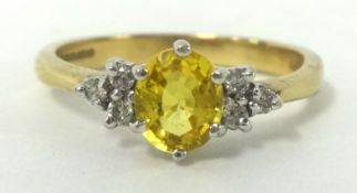 9ct dress ring set with diamonds yellow stone, size O