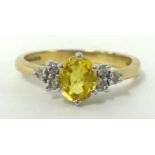 9ct dress ring set with diamonds yellow stone, size O