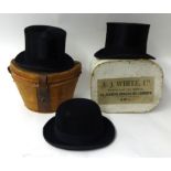 Dunn & Co top hat with leather case, another cased top hat and a bowler hat (3)