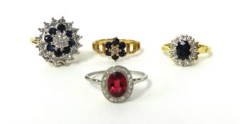 Four various dress rings including 18ct sapphire and diamond cluster, 9ct cluster and platinum and