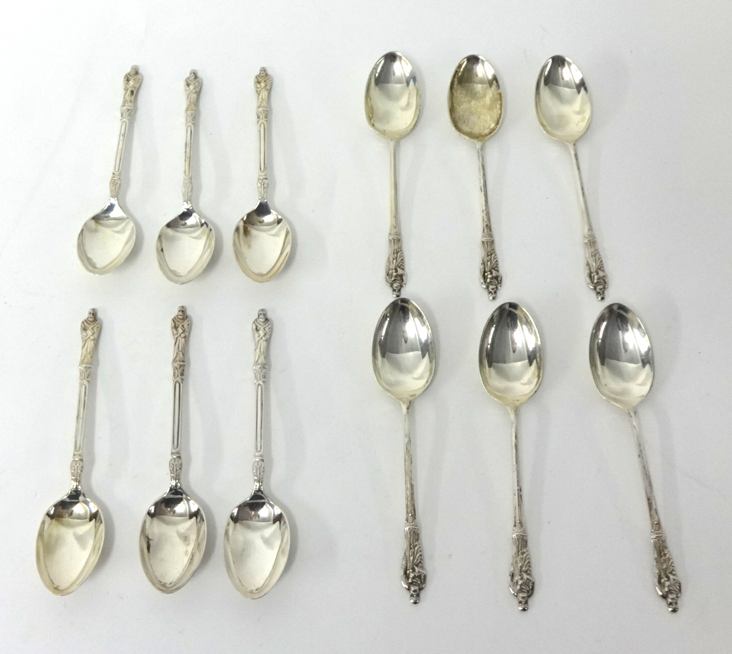 Two sets of silver Apostle tea spoons circa 1920s, 132g