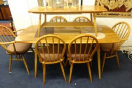 Ercol light elm dining table and six chairs