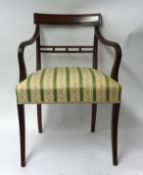 19th century mahogany elbow chair on sabre legs