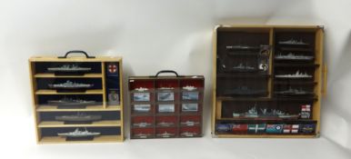 Collection of various model ships with badges (22 in three wall cases)