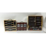 Collection of various model ships with badges (22 in three wall cases)