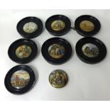 Eight various Pratt ware pot lids including Trafalgar Square (8)